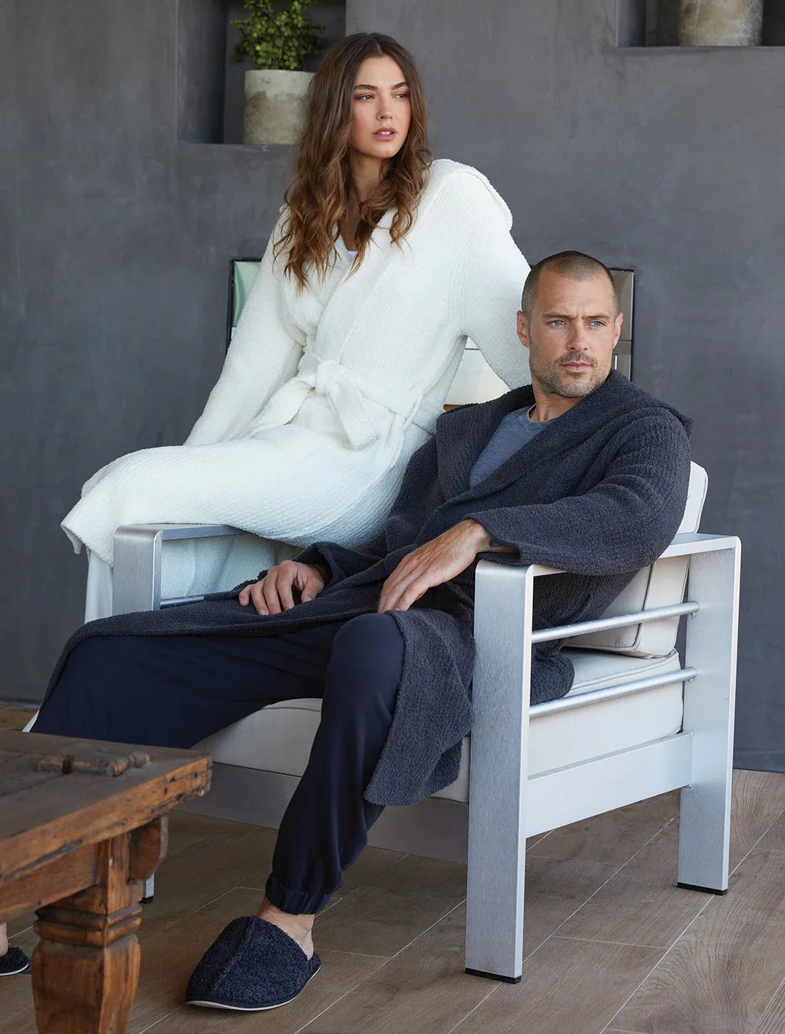 Man and woman wearing pajamas and robes, carried at Girlfriends boutique, Peru, IL